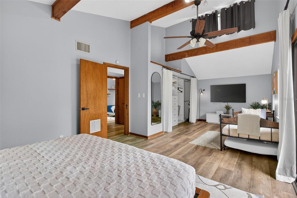 4925 Hamilton Road Lakeland, FL 33811 - Photo 41 of 71 a bedroom with furniture and a flat screen tv