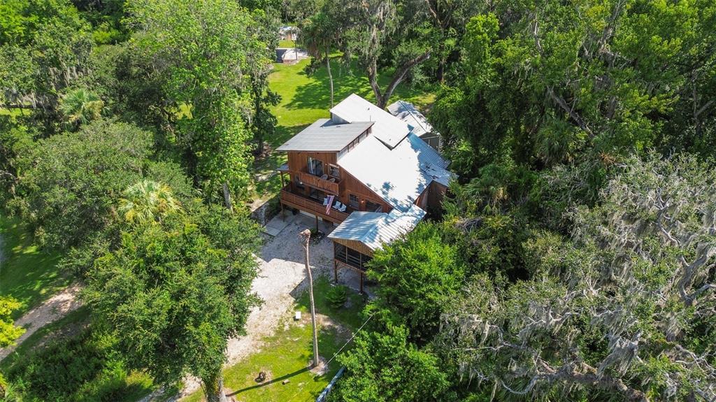 4925 Hamilton Road Lakeland, FL 33811 - Photo 66 of 71 an aerial view of a house with a yard and outdoor seating