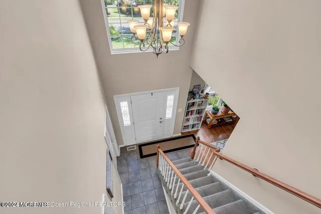 a view of entryway with wooden floor