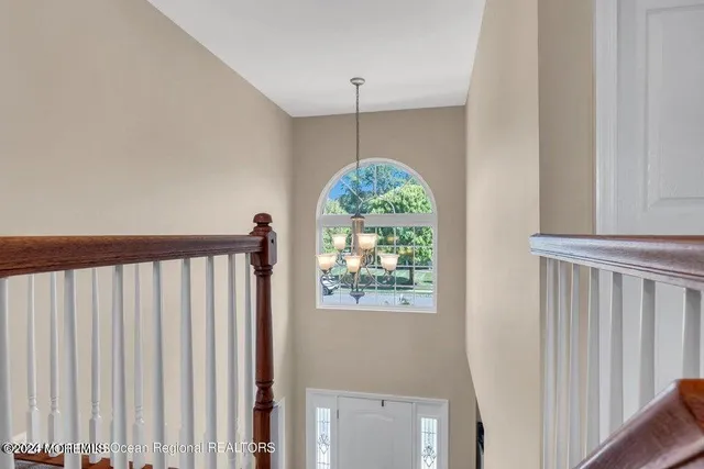 a view of a hallway with windows