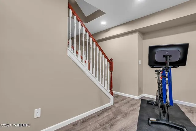 a view of a hallway with a room