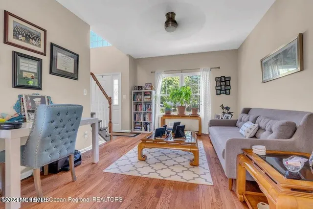 a living room with furniture and a table