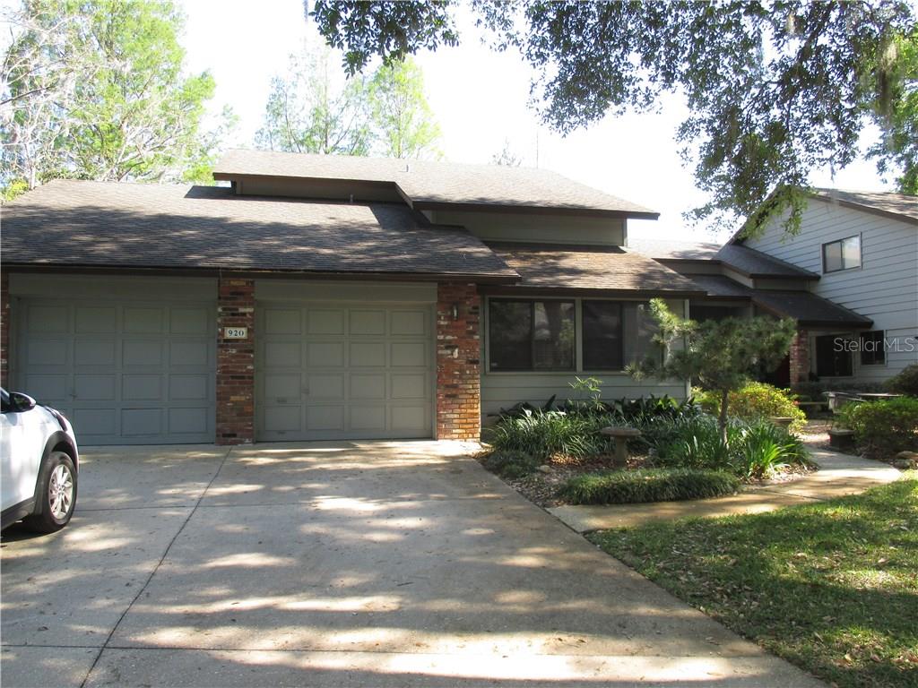 920 Village Green Road, Unit 7 DeLand, FL 32720 - Photo 1 of 1 Front Entry with 2 car garage