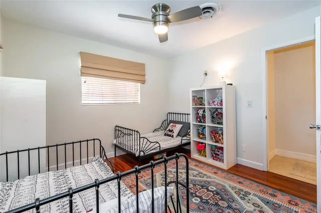 a view of a livingroom with furniture and staircase
