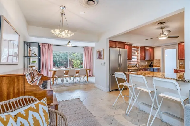 a view of a dining room with furniture window and outside view