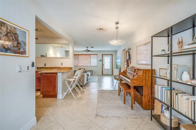 a view of a livingroom with furniture and a window