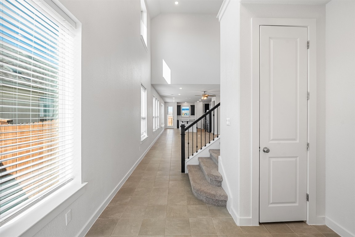 121 Rangel Drive Liberty Hill, TX 78642 - Photo 4 of 23 a view of entryway and hall with wooden floor