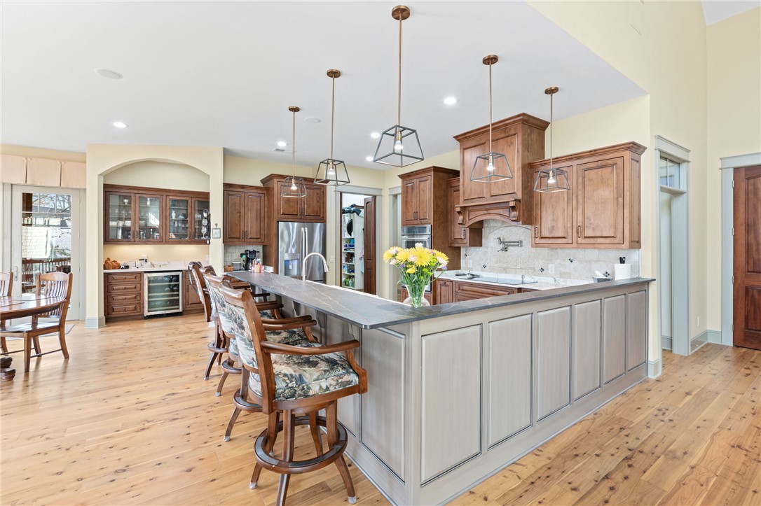 117 Sunrise Ridge Sunset, SC 29685 - Photo 8 of 37 This spacious kitchen offers abundant counter space, sleek appliances, and a welcoming breakfast bar for casual dining.