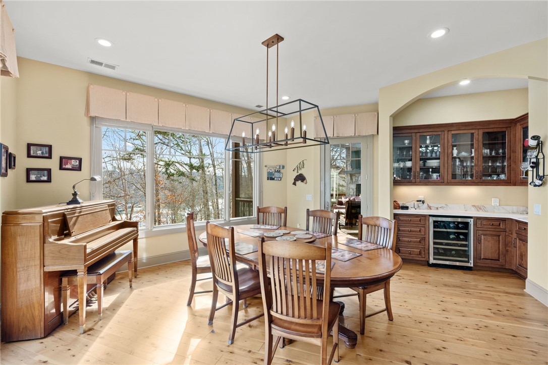 117 Sunrise Ridge Sunset, SC 29685 - Photo 10 of 37 This bright dining area offers an inviting space for gatherings with scenic outdoor views.