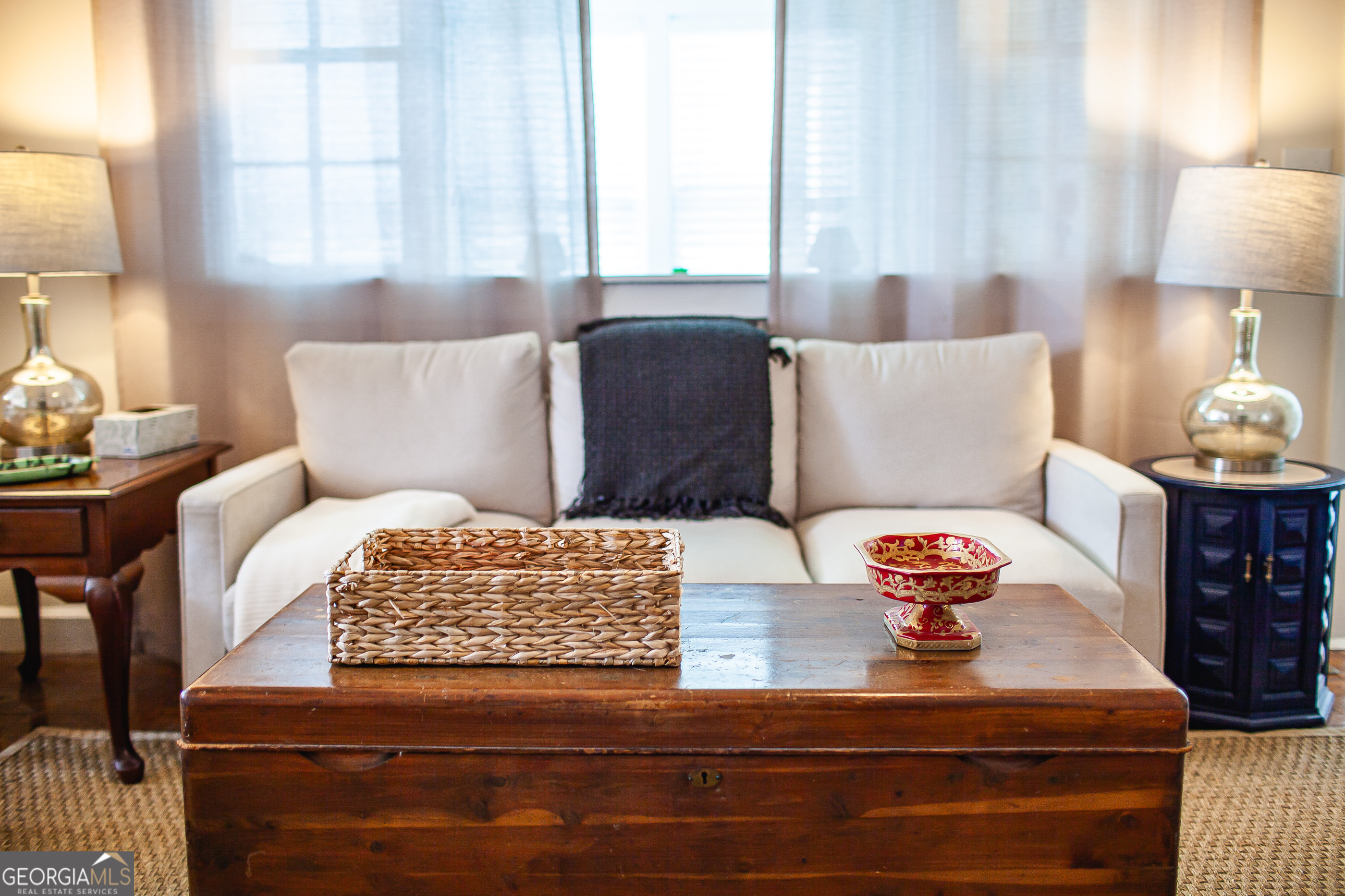 161 Calhoun Road Hamilton, GA 31811 - Photo 59 of 90 a living room with furniture and a lamp