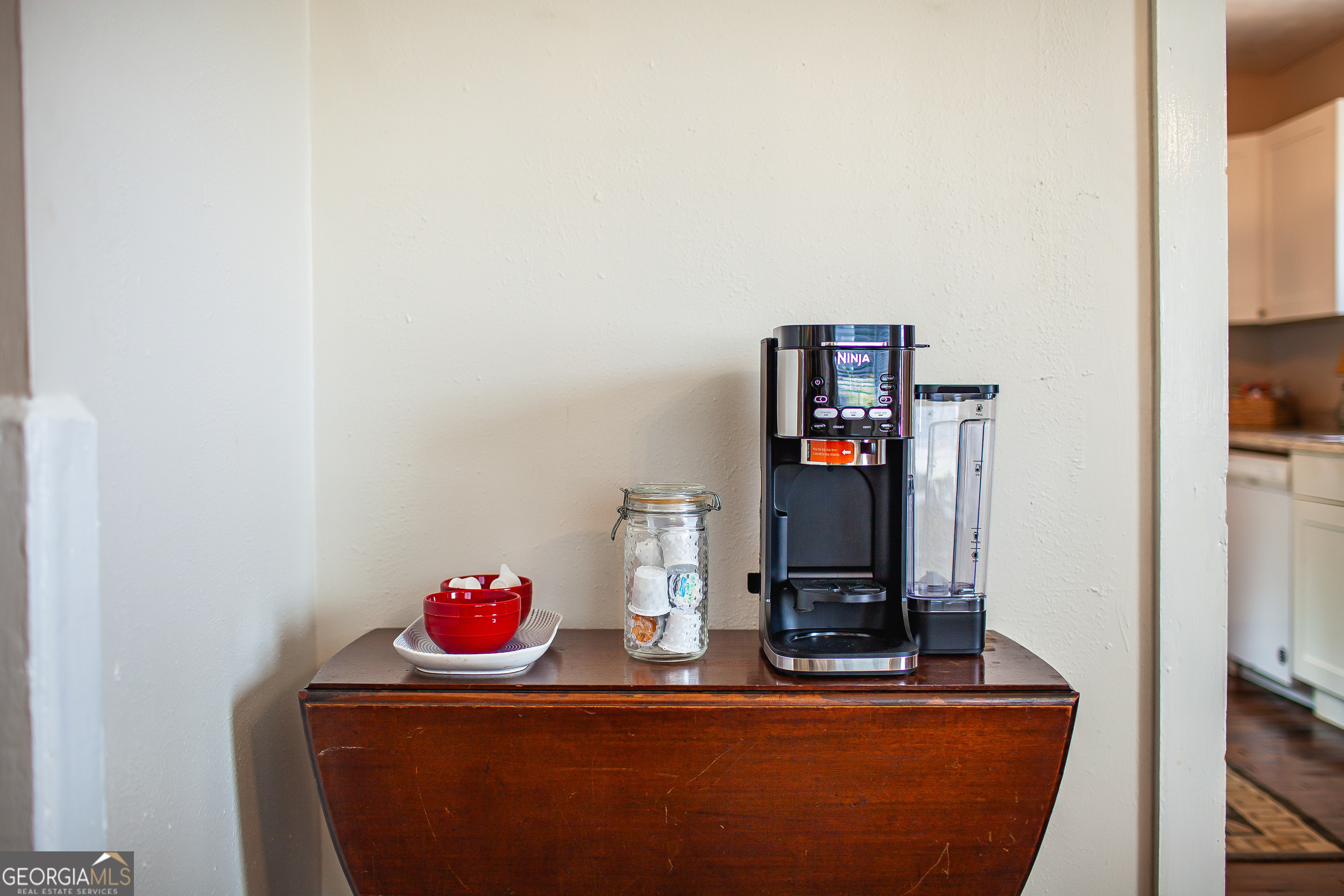 161 Calhoun Road Hamilton, GA 31811 - Photo 63 of 90 a living room with furniture and a flat screen tv