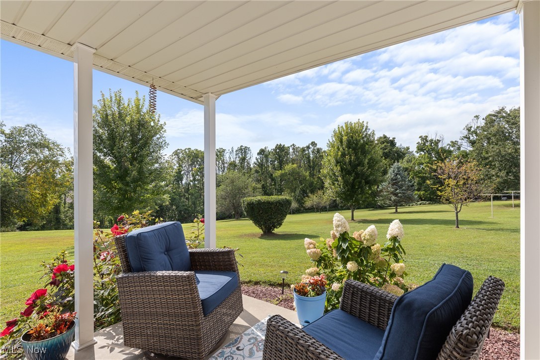 40885 Mt Hope Road Flushing, OH 43977 - Photo 33 of 50 View of patio / terrace with view of scattered trees