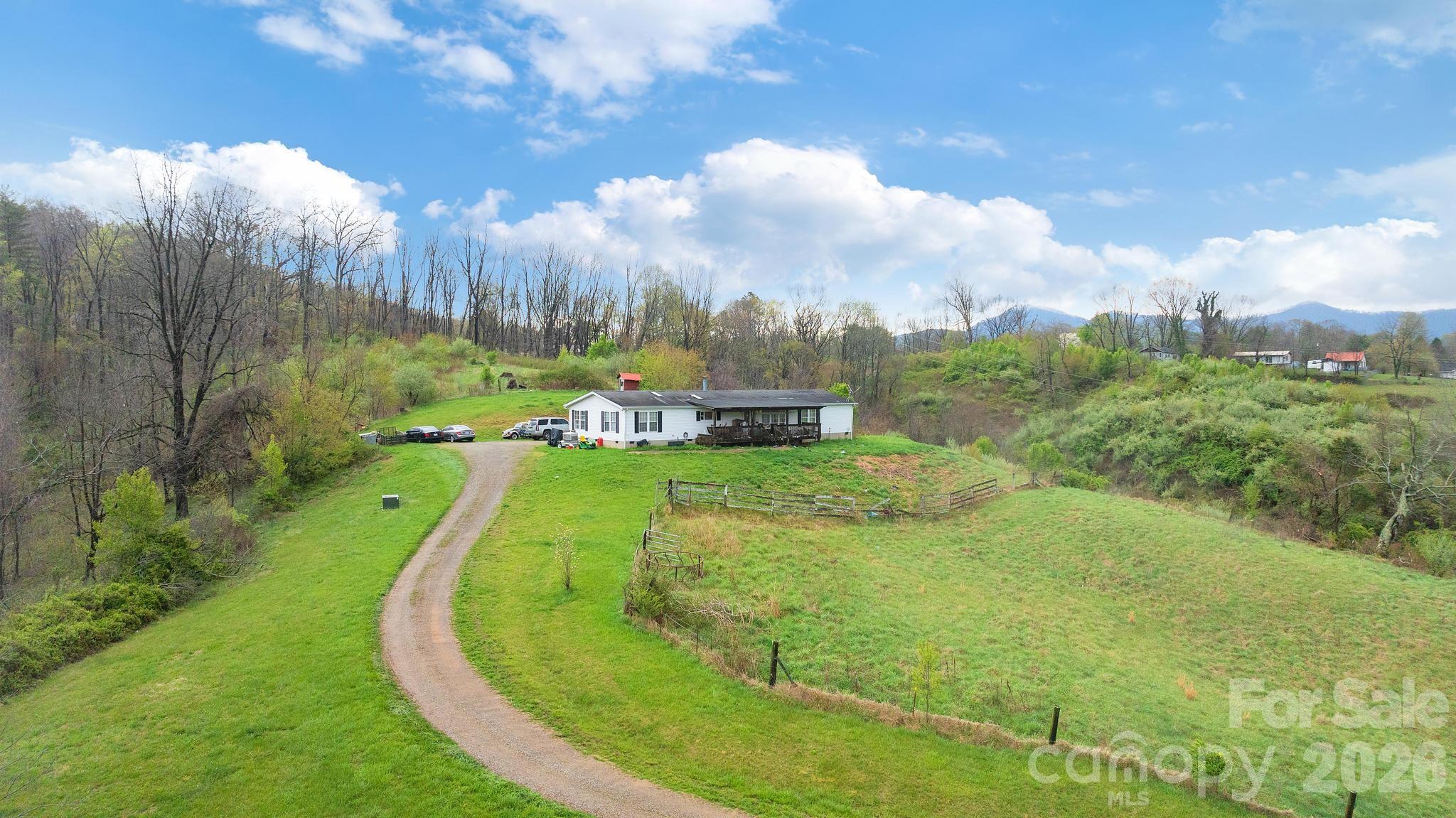 618 Beaverdam Street Canton, NC 28716 - Photo 12 of 21 a view of a golf course with a fountain