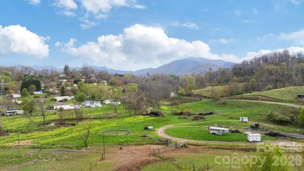a view of a lake with a big yard