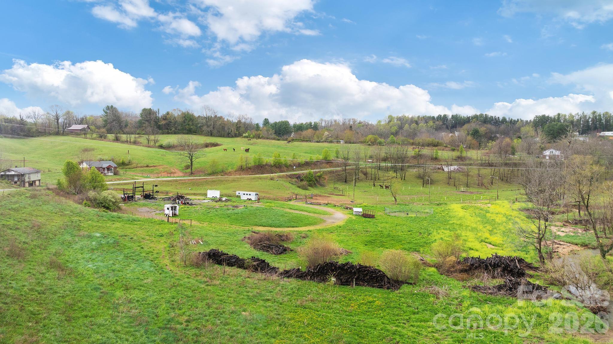 618 Beaverdam Street Canton, NC 28716 - Photo 15 of 21 a view of a lake with a big yard