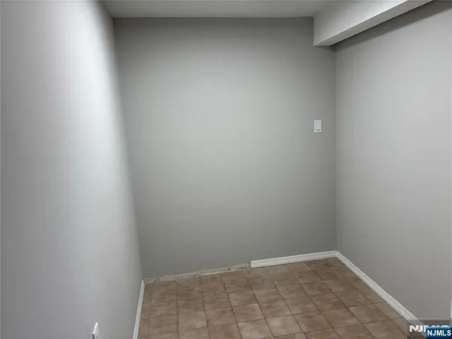 a view of a livingroom with a furniture