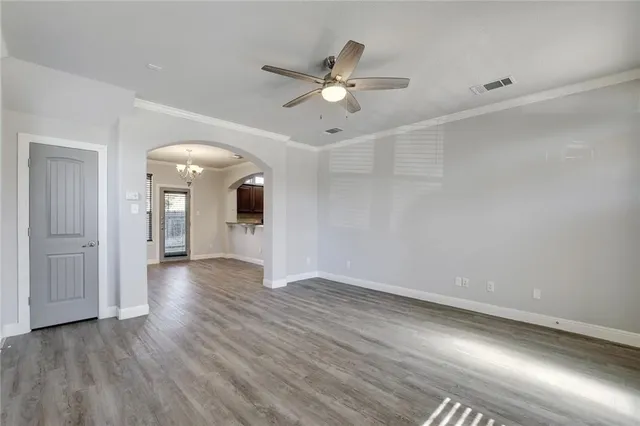 a kitchen with stainless steel appliances granite countertop a sink stove and microwave