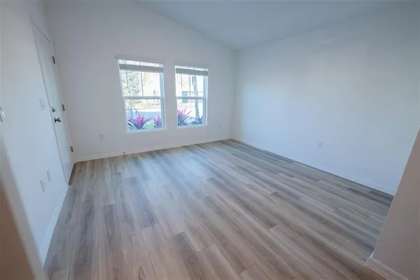 an empty room with windows