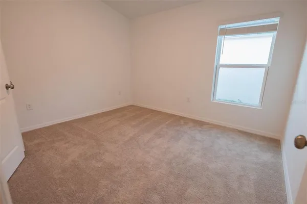 an empty room with a window