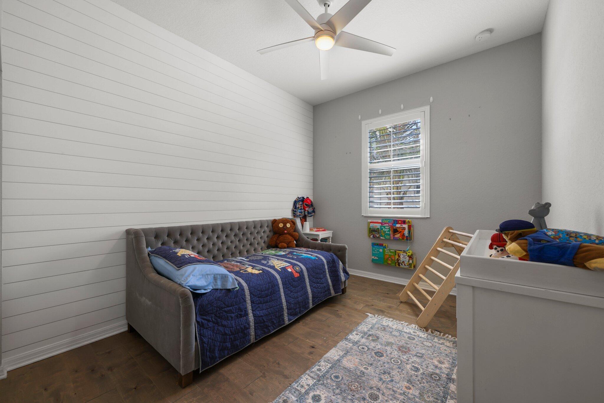 168 Andros Harbour Place Jupiter, FL 33458 - Photo 36 of 71 a bedroom with bed and a window