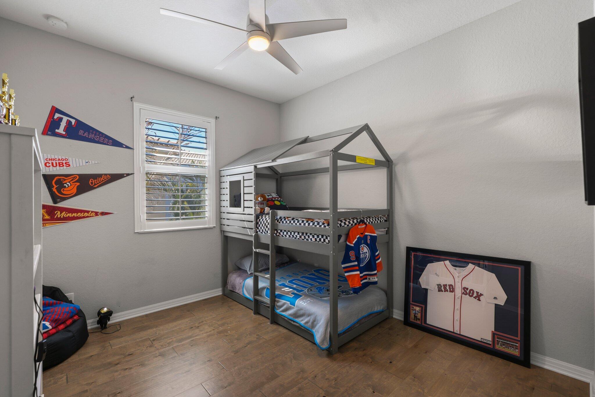 168 Andros Harbour Place Jupiter, FL 33458 - Photo 38 of 71 a bedroom with furniture and a window