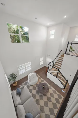 an aerial view of a pool patio outdoor seating and outdoor kitchen