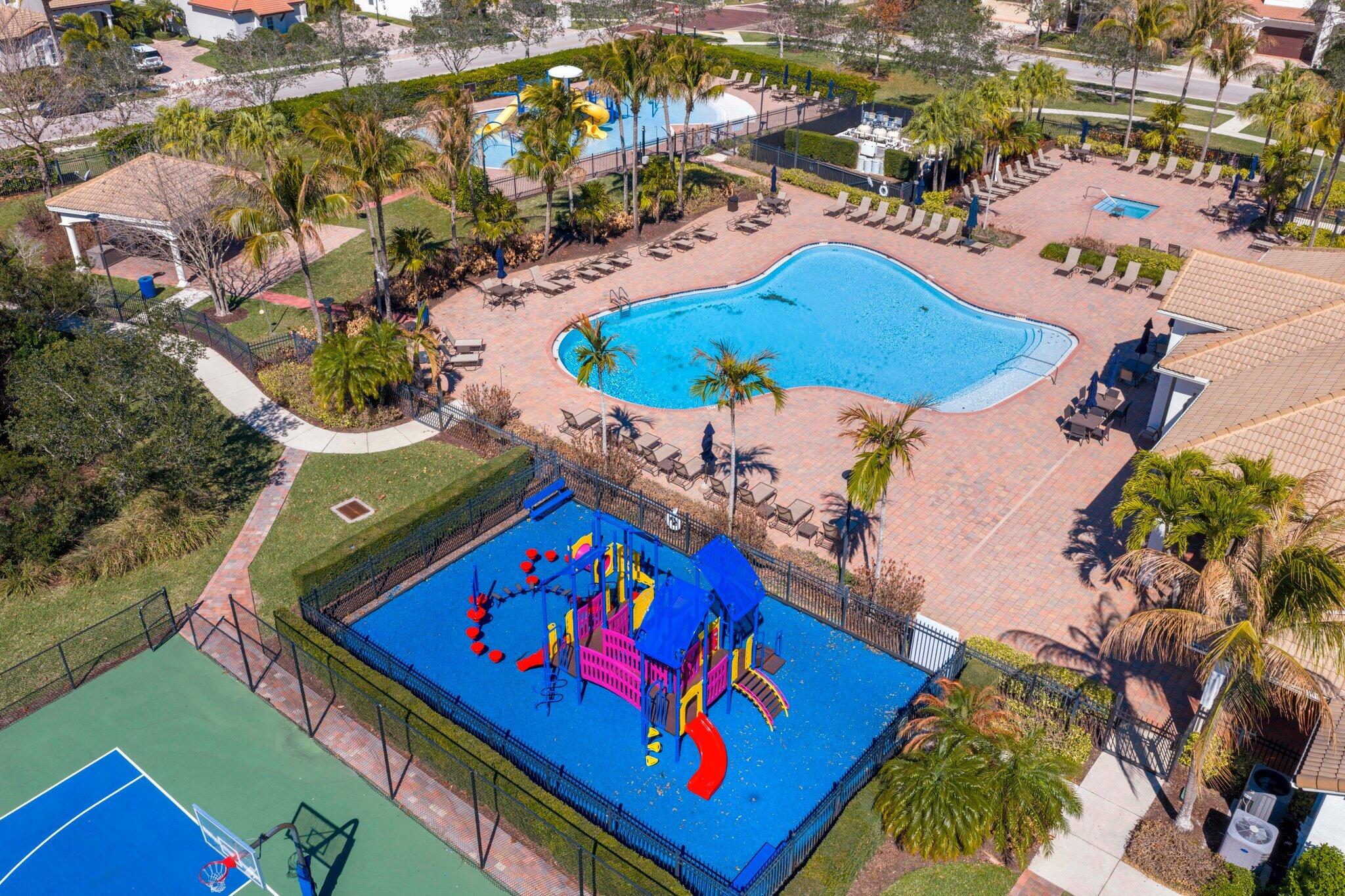 168 Andros Harbour Place Jupiter, FL 33458 - Photo 56 of 71 an aerial view of a pool patio outdoor seating and outdoor kitchen