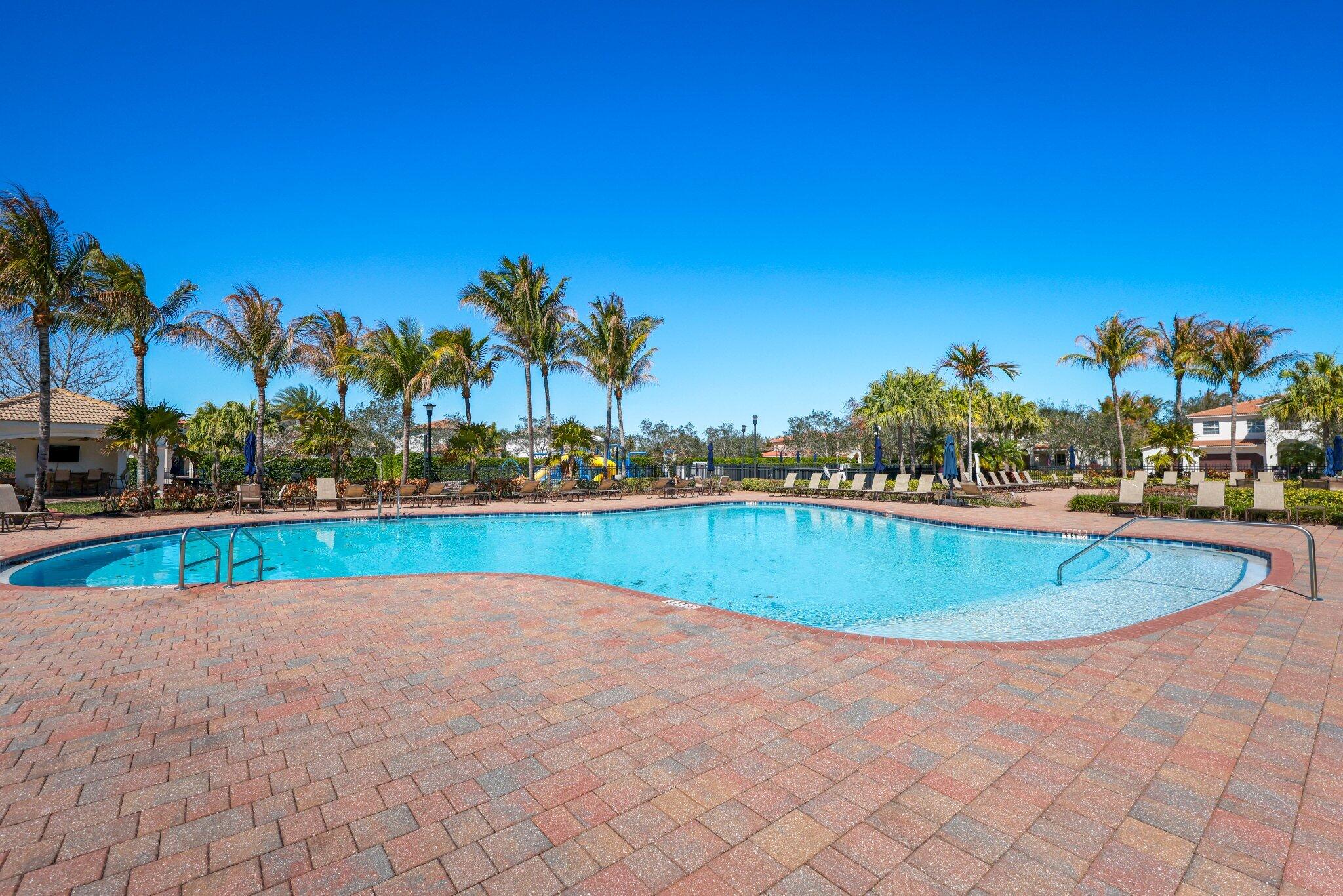 168 Andros Harbour Place Jupiter, FL 33458 - Photo 64 of 71 a view of a swimming pool and an outdoor space