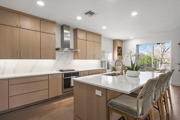 a bathroom with a sink and a window