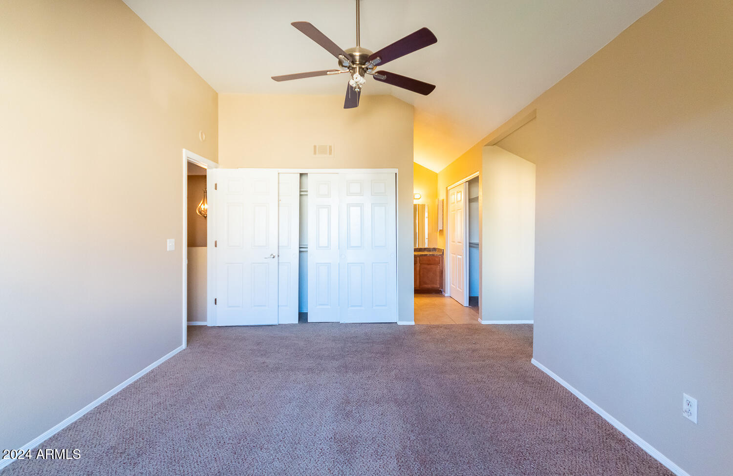 1331 West Baseline Road, Unit 253 Mesa, AZ 85202 - Photo 17 of 31 a view of a big room with a chandelier fan and a ceiling fan