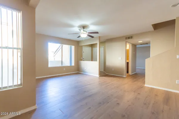 a view of an empty room with a window