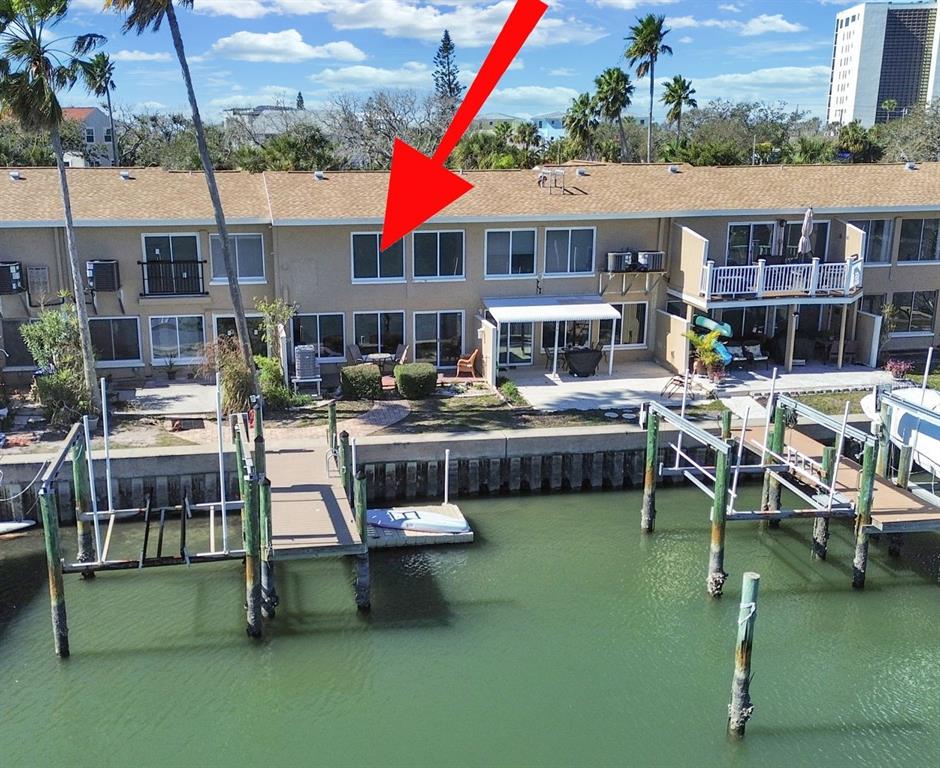 825 East Gulf Boulevard, Unit 110 Indian Rocks Beach, FL 33785 - Photo 47 of 75 a aerial view of a house with swimming pool table and chairs