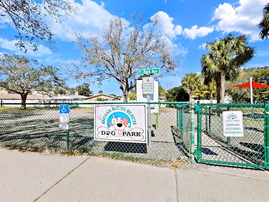 825 East Gulf Boulevard, Unit 110 Indian Rocks Beach, FL 33785 - Photo 57 of 75 a sign on the side of a road