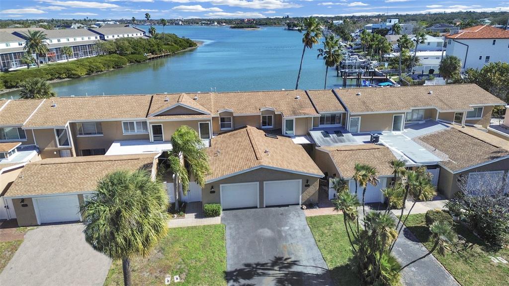 825 East Gulf Boulevard, Unit 110 Indian Rocks Beach, FL 33785 - Photo 7 of 75 an aerial view of a house with garden space and street view