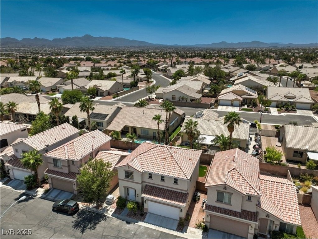979 Park Bridge Avenue Las Vegas, NV 89123 - Photo 42 of 57 Aerial view of residential area featuring a mountainous background