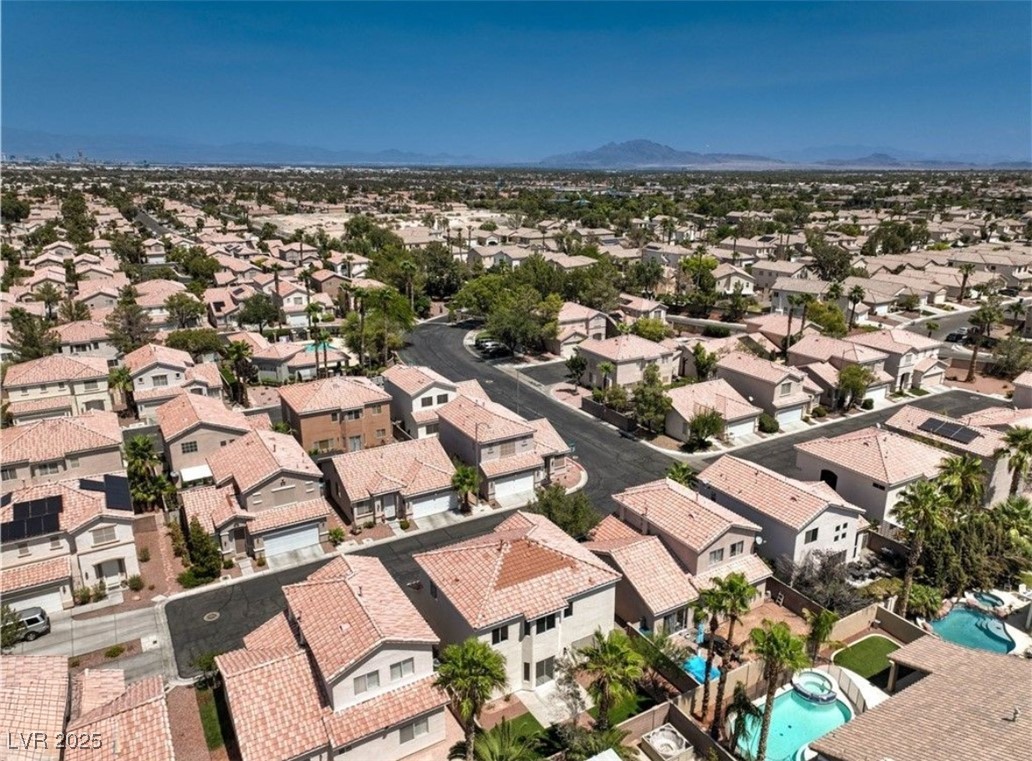 979 Park Bridge Avenue Las Vegas, NV 89123 - Photo 48 of 57 Aerial perspective of suburban area featuring a mountain backdrop
