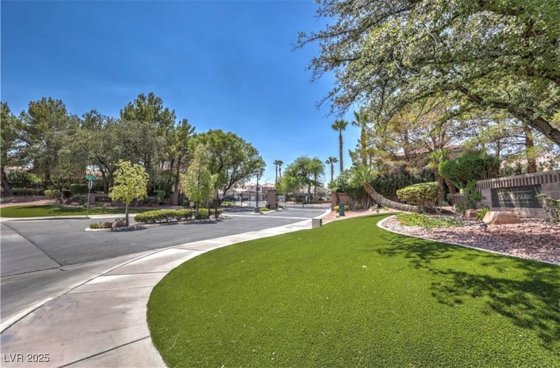 979 Park Bridge Avenue Las Vegas, NV 89123 - Photo 52 of 57 Surrounding community with a lawn