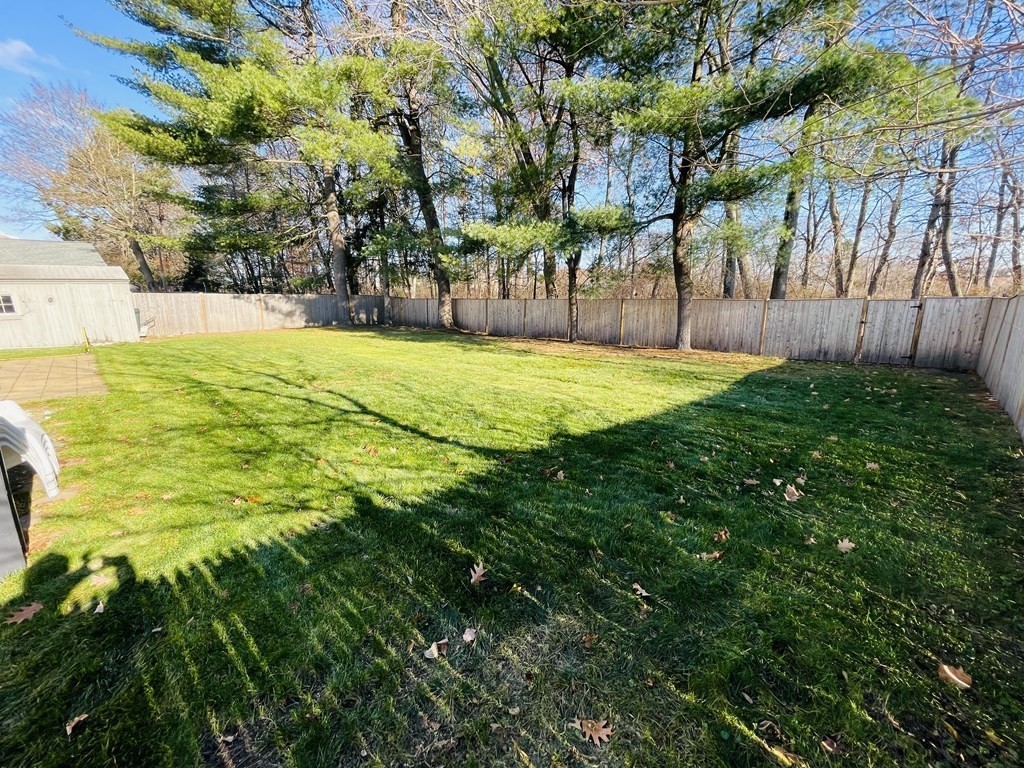 11 Hardwick Road Natick, MA 01760 - Photo 15 of 16 a swimming pool with wooden fence