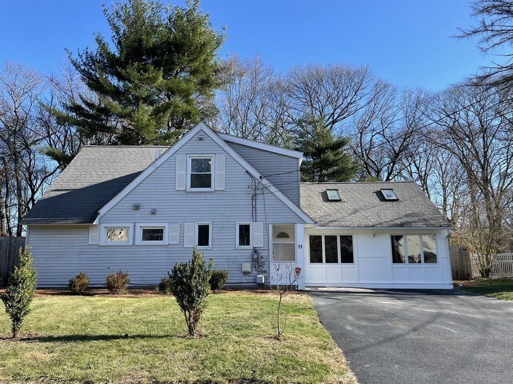 11 Hardwick Road Natick, MA 01760 - Photo 16 of 16 a front view of a house with garden