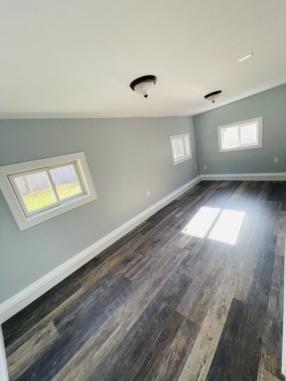 11 Hardwick Road Natick, MA 01760 - Photo 10 of 16 wooden floor in an empty room with a window