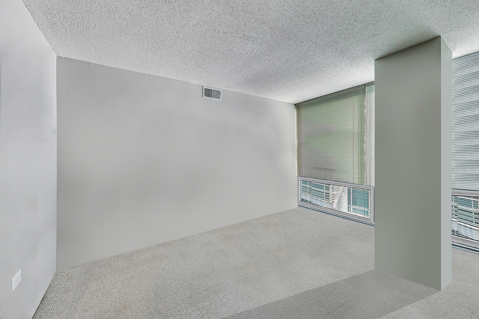 9655 Woods Drive, Unit 1405 Skokie, IL 60077 - Photo 19 of 36 an empty room with windows