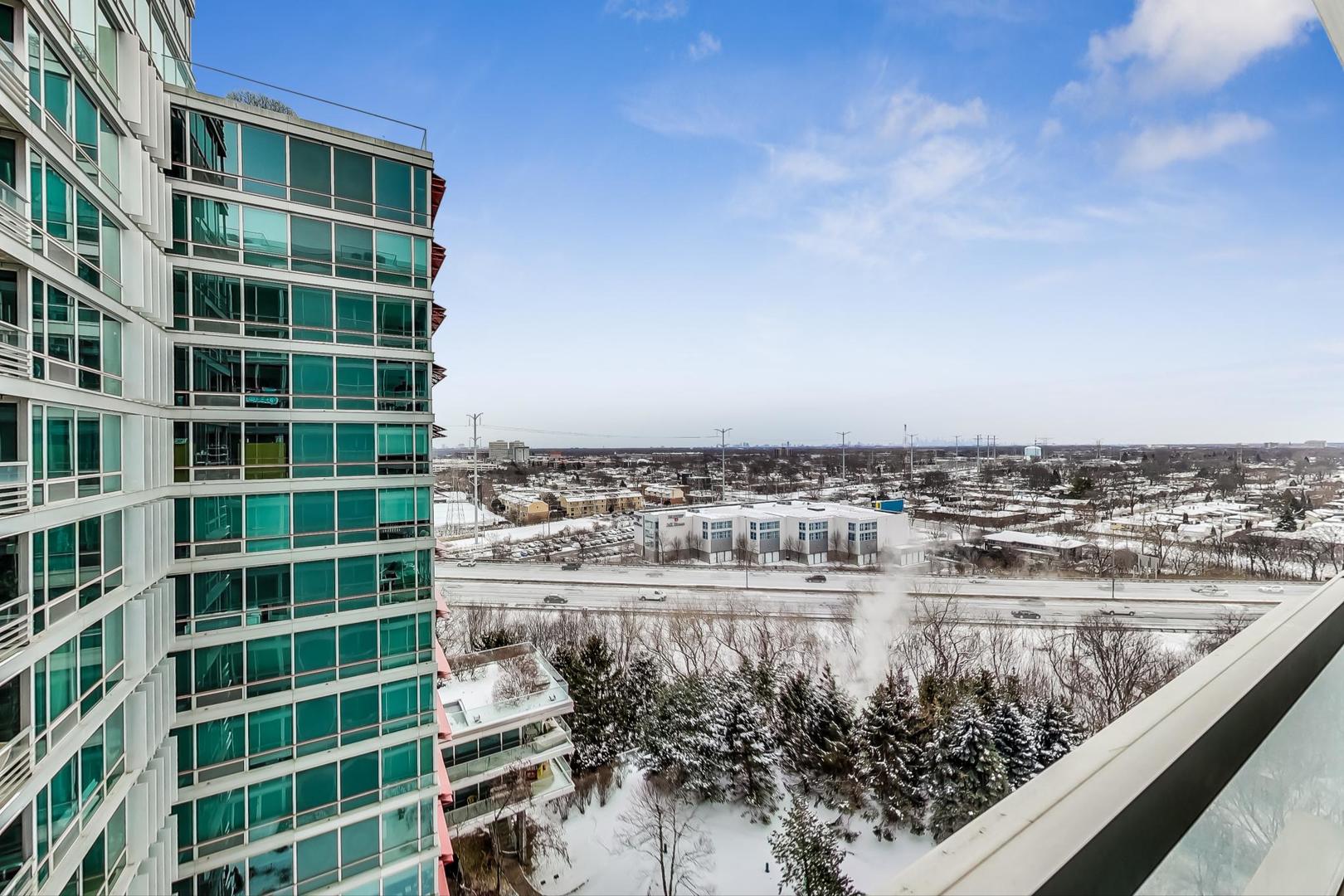 9655 Woods Drive, Unit 1405 Skokie, IL 60077 - Photo 26 of 36 a view of a balcony with a lake view