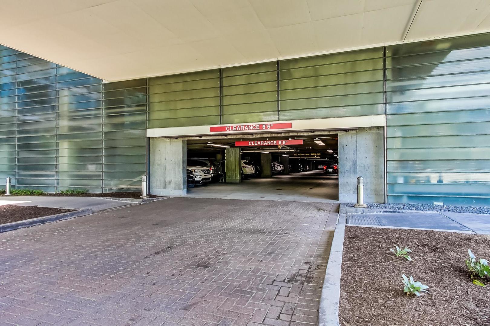 9655 Woods Drive, Unit 1405 Skokie, IL 60077 - Photo 34 of 36 a view of a car garage