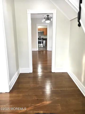 a view of livingroom and hardwood floor