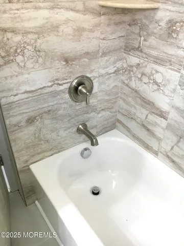 a bathroom with a bathtub