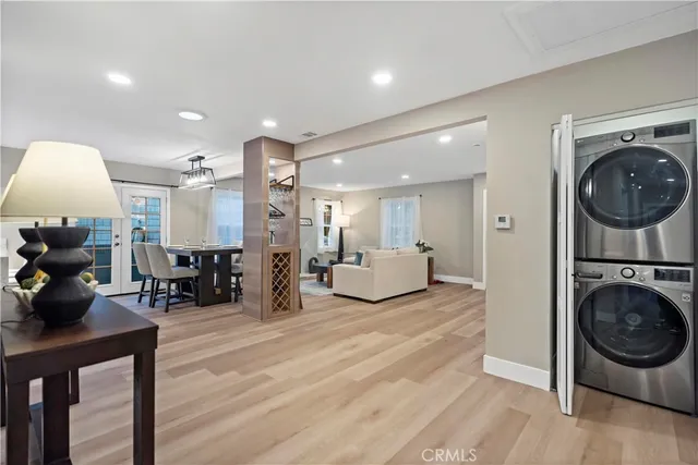 a view of a kitchen and living room with furniture