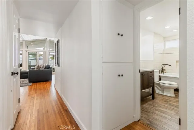 a view of a room with wooden floor and closet