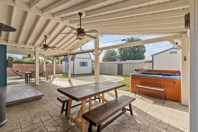 a front view of a house with a garden and porch