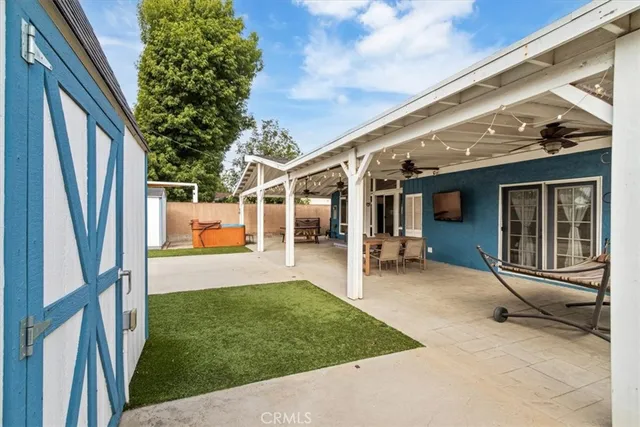 a view of a room with a wooden floor and a porch