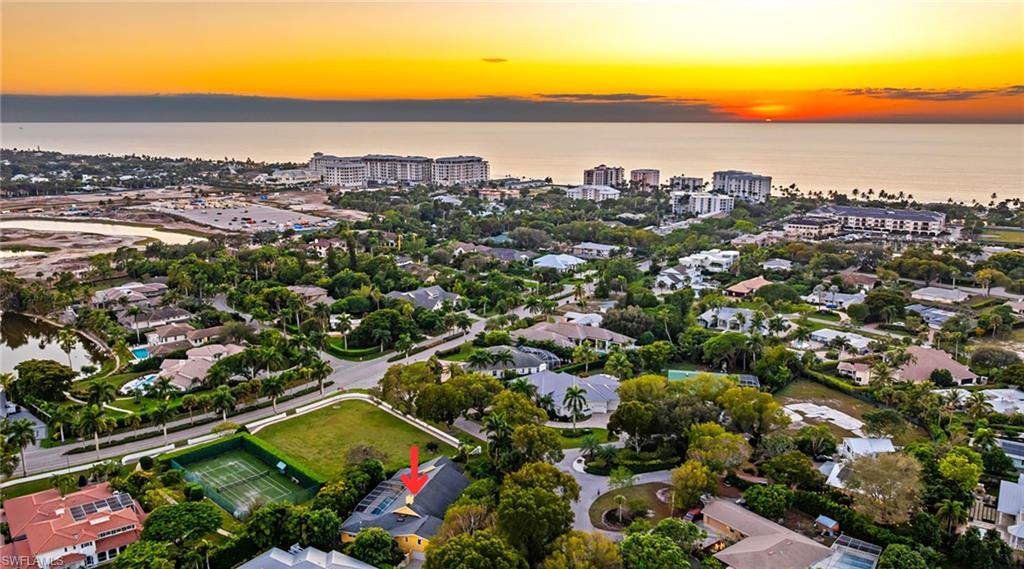 586 Yucca Road Naples, FL 34102 - Photo 25 of 26 View of urban area featuring a nearby body of water and nearby suburban area